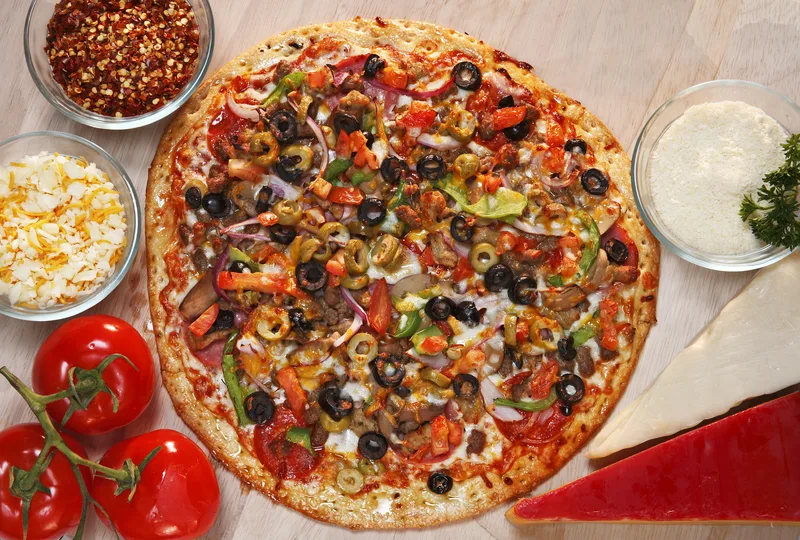 pizza supreme with black olives bell peppers red onions and ground beef