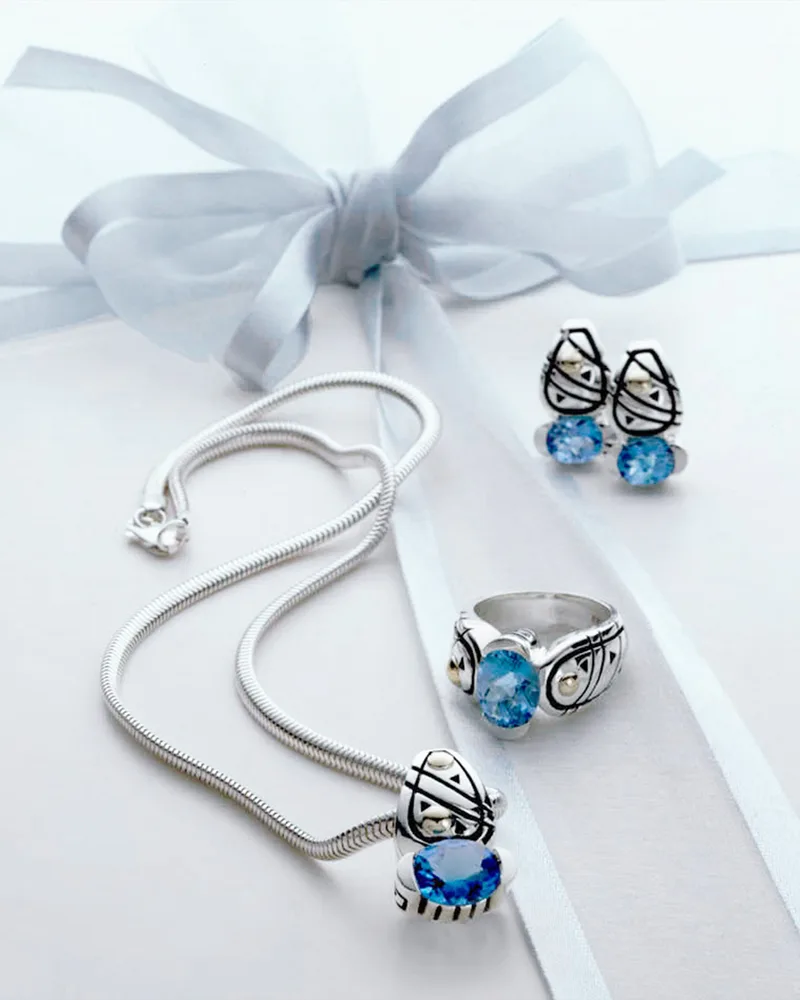 Jewelry photography blue topaz oxidized sterling silver pendant ring and earring set
